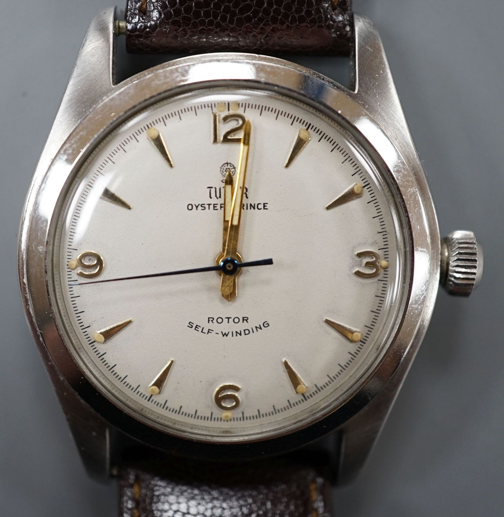 A gentleman's stainless steel Tudor Oyster Prince rotor self-winding wrist watch, case diameter 35mm, on associated leather strap.